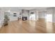 Bright living room with hardwood floors and fireplace at 3955 S Uinta St, Denver, CO 80237