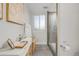 Clean basement bathroom with a shower and modern fixtures at 3955 S Uinta St, Denver, CO 80237