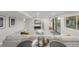 Finished basement with sectional sofa and sliding doors at 3955 S Uinta St, Denver, CO 80237