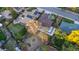 Aerial view of house, yard, and surrounding neighborhood at 3955 S Uinta St, Denver, CO 80237