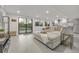 Finished basement apartment with living area and kitchenette at 3955 S Uinta St, Denver, CO 80237