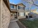 Two-story home with a two-car garage and front entrance at 13031 Dexter St, Thornton, CO 80241
