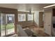 Kitchen with stainless steel appliances and access to backyard at 13031 Dexter St, Thornton, CO 80241
