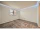 Cozy bedroom with carpeted floor, window, and LED lighting at 17896 E Colgate Pl, Aurora, CO 80013