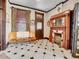 Sitting room with fireplace, tiled floor, and dark wood accents at 3611-3615 Osage St, Denver, CO 80211