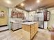 Spacious kitchen featuring stainless steel appliances and granite countertops at 3611-3615 Osage St, Denver, CO 80211