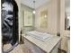 Spa-like bathroom with a built-in soaking tub and cave shower at 3611-3615 Osage St, Denver, CO 80211