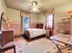 Bedroom with antique furniture and wood floors at 3611-3615 Osage St, Denver, CO 80211