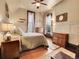 Charming bedroom with hardwood floors and a ceiling fan at 3611-3615 Osage St, Denver, CO 80211