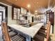 Large kitchen with granite counters and bar seating at 3611-3615 Osage St, Denver, CO 80211
