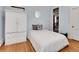Small bedroom with white built-in wardrobe at 3611-3615 Osage St, Denver, CO 80211