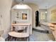 Unique bathroom with a large soaking tub and ornate vanity at 3611-3615 Osage St, Denver, CO 80211