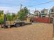 Large backyard with gravel and a trailer of bricks at 3611-3615 Osage St, Denver, CO 80211