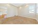 Well-lit bedroom featuring neutral walls and plush carpeting at 3181 S Elati St, Englewood, CO 80110