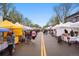 Bustling outdoor farmer's market in the town square at 1219 Sunrise Dr, Erie, CO 80516