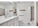 Clean bathroom with white vanity, shower/tub combo, and tile flooring at 2481 Santa Fe Dr # C, Longmont, CO 80504