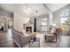 Spacious living room with fireplace and access to balcony at 3231 E 103Rd Pl # 308, Thornton, CO 80229