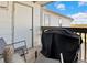 Private patio with a gas grill and outdoor seating at 3231 E 103Rd Pl # 308, Thornton, CO 80229