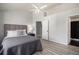 Spacious bedroom with a plush bed and ample floor space at 3231 E 103Rd Pl # 308, Thornton, CO 80229
