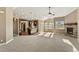 Bright and airy living room with high ceilings and neutral colors at 59304 E Commanche Way, Strasburg, CO 80136
