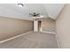 Bright bedroom with ceiling fan and carpet flooring at 59304 E Commanche Way, Strasburg, CO 80136