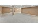 Large finished basement recreation area at 59304 E Commanche Way, Strasburg, CO 80136