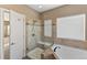 Bathroom with a large walk-in shower and corner bathtub at 59304 E Commanche Way, Strasburg, CO 80136