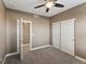 Bedroom with double door closet and access to bathroom at 59304 E Commanche Way, Strasburg, CO 80136