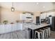 Spacious kitchen with island, stainless steel appliances, and white cabinets at 2640 Cache Creek Ct, Castle Rock, CO 80108