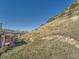 Landscaped backyard with mountain views at 6926 Old Ranch Trl, Littleton, CO 80125