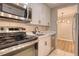 Modern kitchen with stainless steel appliances at 2 Adams St # 1204, Denver, CO 80206
