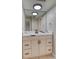 Updated bathroom with a white vanity at 2 Adams St # 1204, Denver, CO 80206