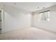 Simple bedroom with neutral decor and carpet flooring at 2312 S University Blvd, Denver, CO 80210