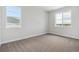 Cozy bedroom with plush carpet and large windows at 5075 Hickory Oaks St, Castle Rock, CO 80104