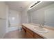 Bathroom with a bathtub, toilet and single vanity at 930 Button Rock Dr # J59, Longmont, CO 80504