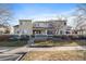 Attractive exterior of a townhome with landscaping and a walkway at 930 Button Rock Dr # J59, Longmont, CO 80504