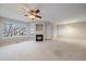 Spacious living room with fireplace and lots of natural light at 930 Button Rock Dr # J59, Longmont, CO 80504