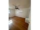 Spacious bedroom featuring hardwood floors and a ceiling fan at 3273 S Florence Ct, Denver, CO 80231