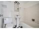 Clean bathroom with pedestal sink and tub shower combo at 85 N Grant St # 22, Denver, CO 80203