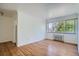 Bright bedroom with hardwood floors and large window at 85 N Grant St # 22, Denver, CO 80203