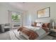 Spacious bedroom with large window and plush bedding at 85 N Grant St # 22, Denver, CO 80203