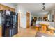 Eat-in kitchen with a built in table and access to the living room at 24087 Deer Valley Rd, Golden, CO 80401