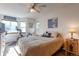 Bedroom with a queen-size bed and plenty of natural light at 24087 Deer Valley Rd, Golden, CO 80401