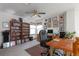 Bright home office with built-in bookshelves and a workspace at 24087 Deer Valley Rd, Golden, CO 80401
