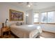 Bedroom with a queen-size bed and bay windows at 24087 Deer Valley Rd, Golden, CO 80401