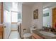 Convenient laundry room with washer, dryer, and extra storage at 24087 Deer Valley Rd, Golden, CO 80401