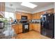 Updated kitchen with granite countertops and stainless steel appliances at 24087 Deer Valley Rd, Golden, CO 80401