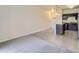 Living room with wood-look floors and carpet at 4100 Albion St # 512, Denver, CO 80216