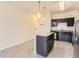 Modern kitchen with stainless steel appliances and island at 4100 Albion St # 512, Denver, CO 80216