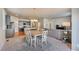 Bright dining area with table and chairs, adjacent to kitchen at 5721 Echo Park Cir, Castle Rock, CO 80104